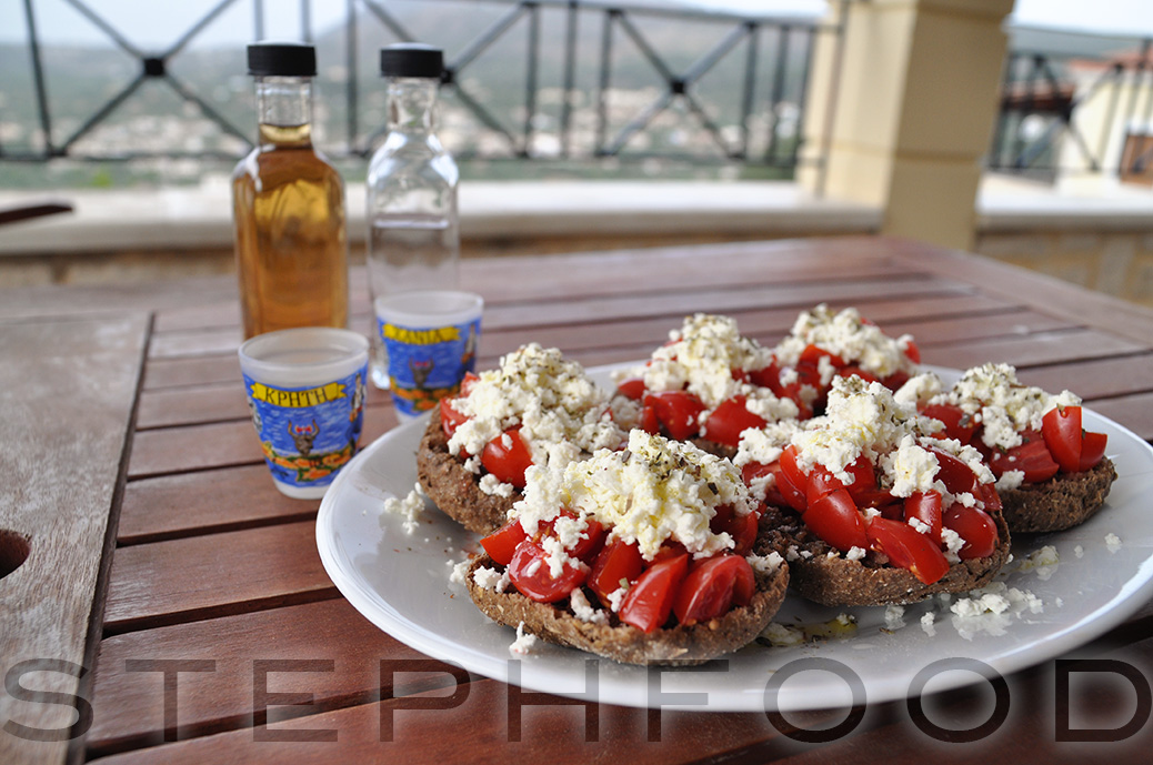 Cretan dakos, a couple of bottles of raki and some corny touristy shot glasses.